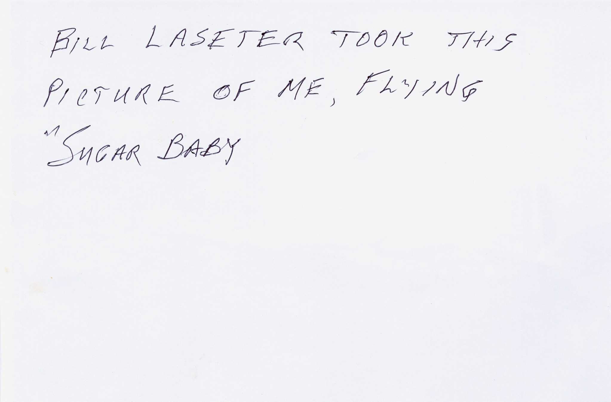 Description Back Of Photo Sugar Baby In Flight Piloted By Jim Phillips Description Back Of Photo Sugar Baby In Flight Piloted By Jim Phillips